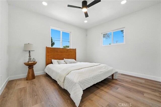 14581460 W 80th St, Los Angeles, CA 90047 - bedroom featuring light wood-style floors, recessed lighting, and ceiling fan