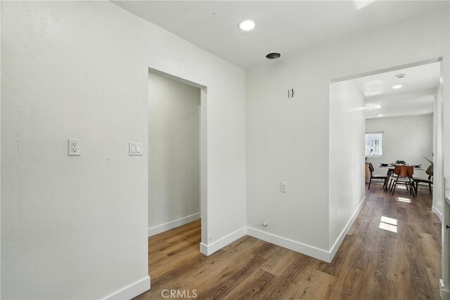 14581460 W 80th St, Los Angeles, CA 90047 - corridor with wood finished floors and recessed lighting
