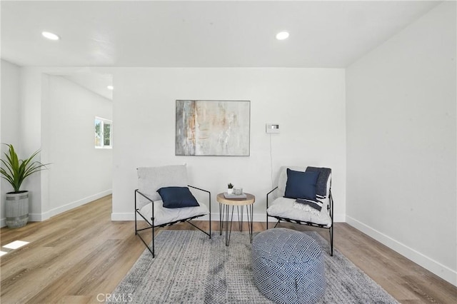 14581460 W 80th St, Los Angeles, CA 90047 - sitting room featuring wood finished floors and recessed lighting