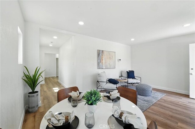 14581460 W 80th St, Los Angeles, CA 90047 - dining room with wood finished floors and recessed lighting