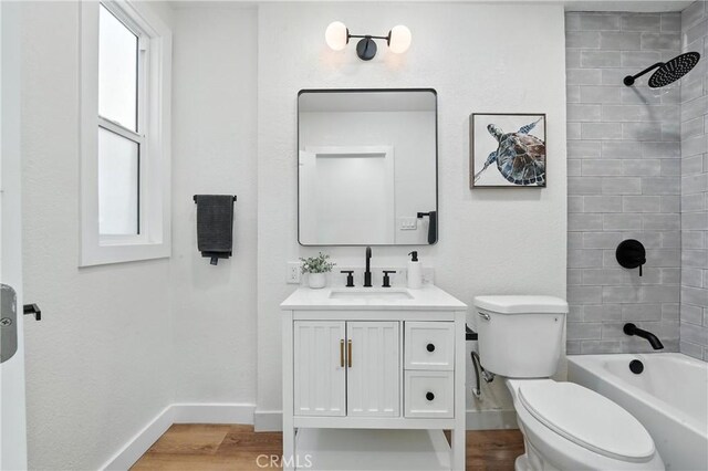 14581460 W 80th St, Los Angeles, CA 90047 - bathroom featuring vanity, wood finished floors, and bathing tub / shower combination