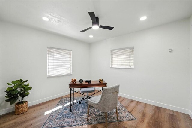 14581460 W 80th St, Los Angeles, CA 90047 - home office with a ceiling fan, plenty of natural light, wood finished floors, and recessed lighting