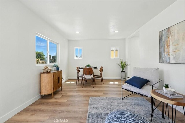 14581460 W 80th St, Los Angeles, CA 90047 - living area featuring light wood-style flooring and recessed lighting