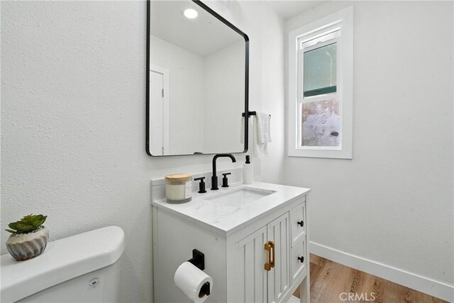 14581460 W 80th St, Los Angeles, CA 90047 - half bath featuring vanity and wood finished floors
