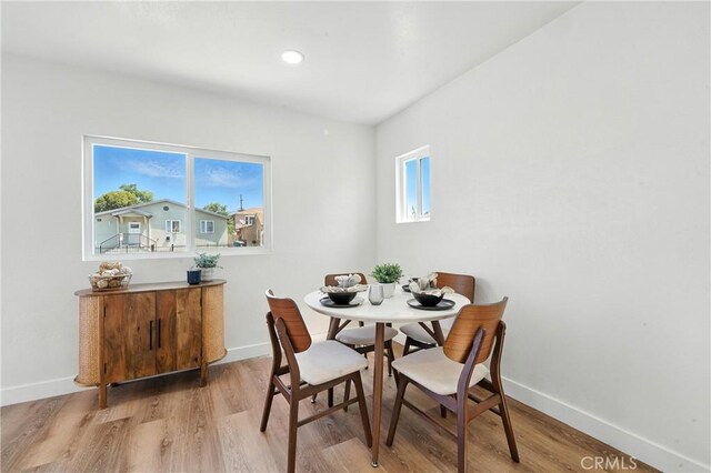 14581460 W 80th St, Los Angeles, CA 90047 - dining area featuring light wood-type flooring