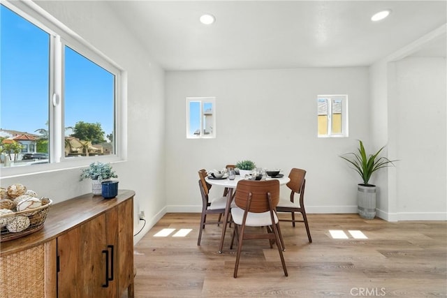 14581460 W 80th St, Los Angeles, CA 90047 - dining area featuring healthy amount of natural light, light wood finished floors, and recessed lighting