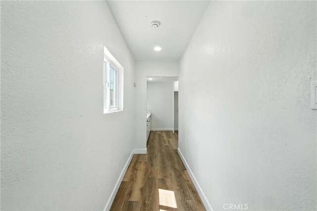 14581460 W 80th St, Los Angeles, CA 90047 - hallway with wood finished floors and baseboards