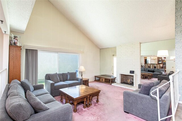 14772 Forrest Ln, Westminster, CA 92683 - carpeted living room with high vaulted ceiling, a brick fireplace, plenty of natural light, and a textured ceiling