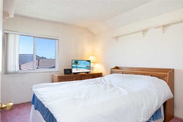 14772 Forrest Ln, Westminster, CA 92683 - bedroom featuring carpet floors, vaulted ceiling, and a textured ceiling