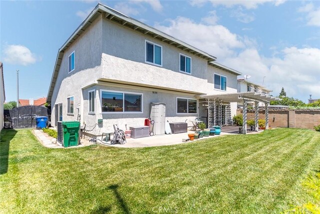 14772 Forrest Ln, Westminster, CA 92683 - back of house featuring a pergola, a patio, stucco siding, and a fenced backyard