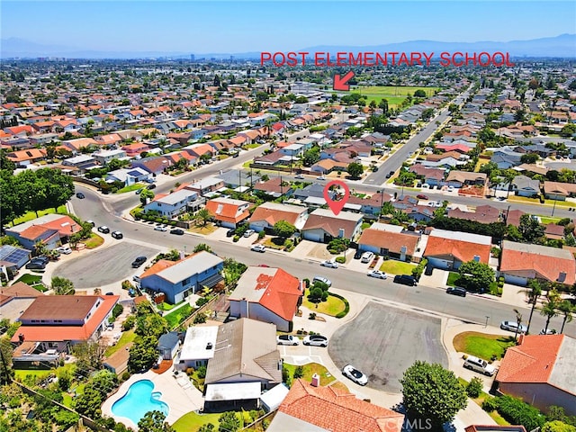 14772 Forrest Ln, Westminster, CA 92683 - aerial perspective of suburban area with a pool