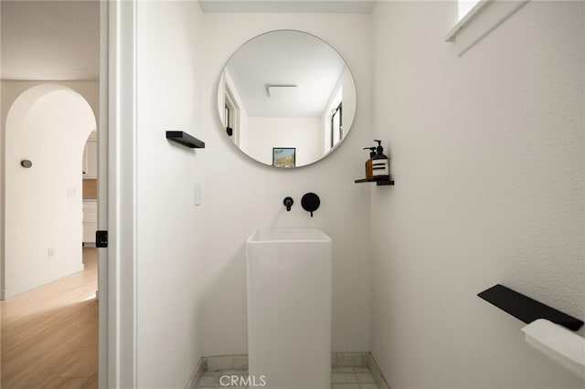 680 E Workman St, Covina, CA 91723 - bathroom with baseboards and wood finished floors