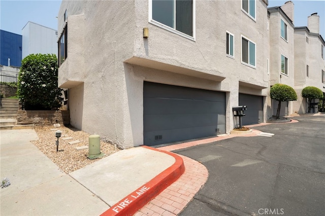 680 E Workman St, Covina, CA 91723 - view of property featuring an attached garage