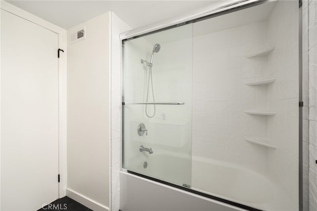 680 E Workman St, Covina, CA 91723 - full bathroom with shower / bath combination with glass door and baseboards