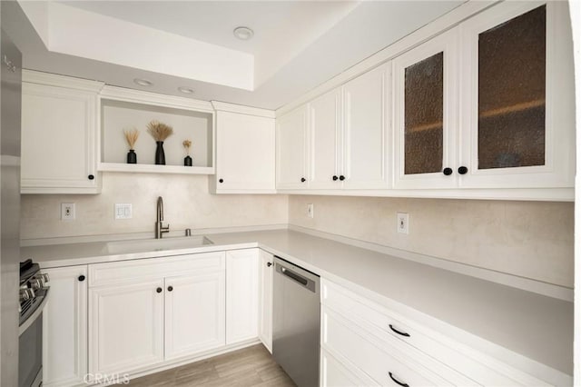 680 E Workman St, Covina, CA 91723 - kitchen featuring appliances with stainless steel finishes, open shelves, light countertops, white cabinetry, and recessed lighting
