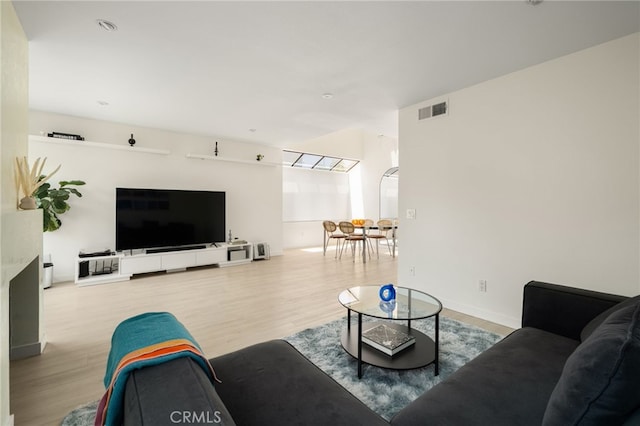 680 E Workman St, Covina, CA 91723 - living room featuring wood finished floors