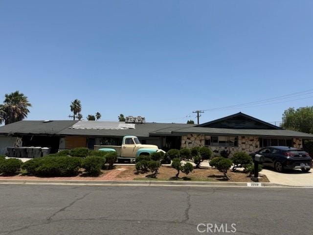 2089 Monterey Peninsula Dr, Corona, CA 92882 - ranch-style home featuring stone siding