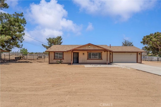 18396 Live Oak St, Hesperia, CA 92345 - view of front of house with concrete driveway and a garage