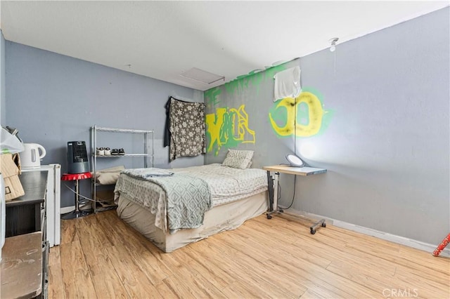 18396 Live Oak St, Hesperia, CA 92345 - bedroom featuring wood finished floors and attic access