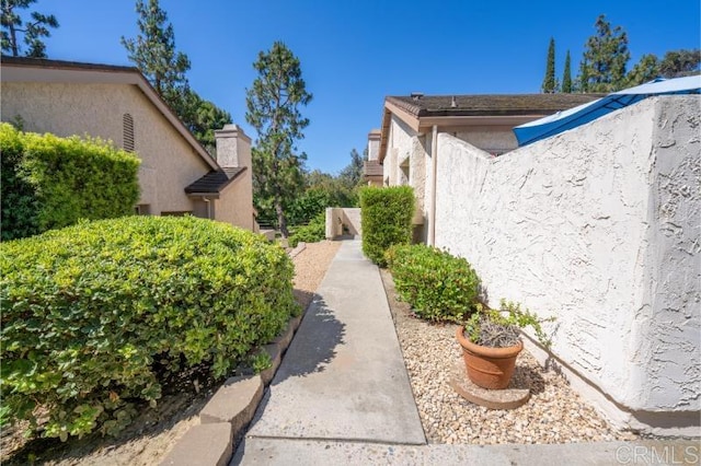 814 Cardamom Ct, Chula Vista, CA 91910 - view of side of home featuring stucco siding