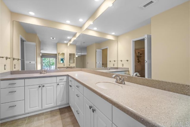 814 Cardamom Ct, Chula Vista, CA 91910 - bathroom featuring double vanity, recessed lighting, and a shower