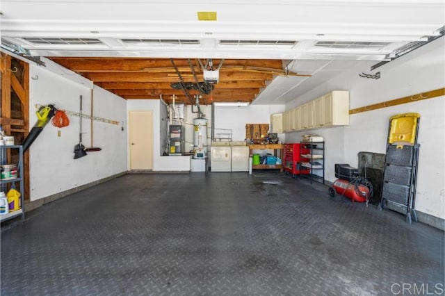 814 Cardamom Ct, Chula Vista, CA 91910 - garage featuring water heater and a garage door opener