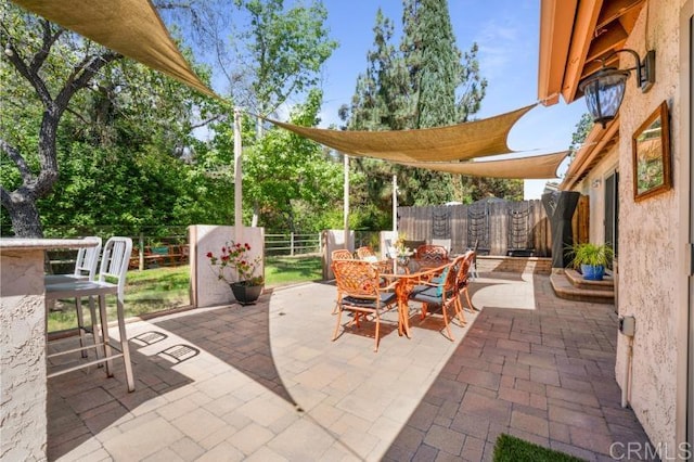 814 Cardamom Ct, Chula Vista, CA 91910 - fenced backyard with outdoor dining space and a patio