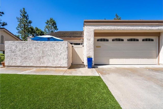 814 Cardamom Ct, Chula Vista, CA 91910 - garage with concrete driveway and a gate