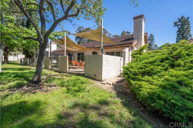 814 Cardamom Ct, Chula Vista, CA 91910 - back of property with stucco siding