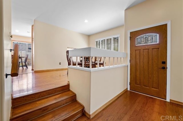 814 Cardamom Ct, Chula Vista, CA 91910 - entrance foyer with wood finished floors, recessed lighting, and stairway