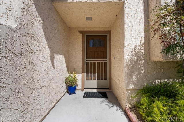 814 Cardamom Ct, Chula Vista, CA 91910 - doorway to property with stucco siding
