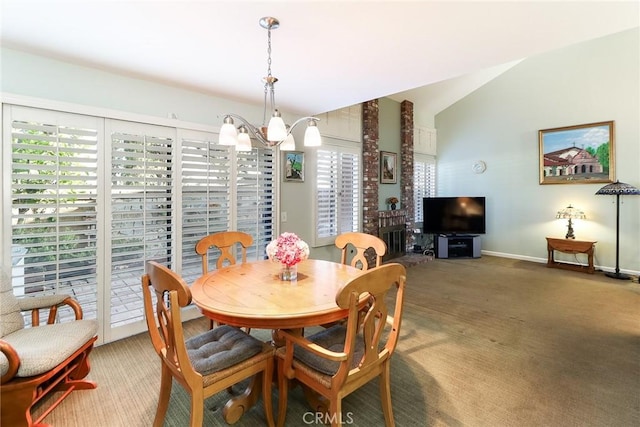 511 W Puente St Unit 4, Covina, CA 91722 - carpeted dining space featuring a chandelier and vaulted ceiling