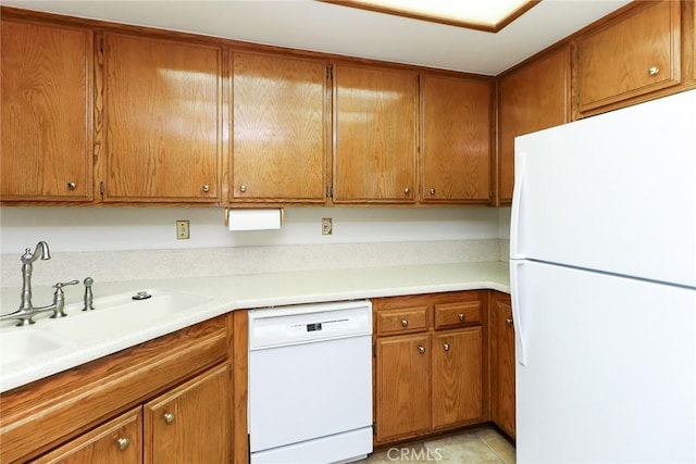 511 W Puente St Unit 4, Covina, CA 91722 - kitchen with white appliances, brown cabinetry, and light countertops