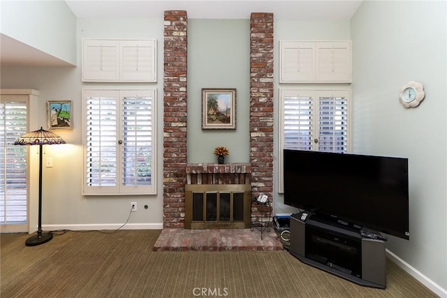 511 W Puente St Unit 4, Covina, CA 91722 - carpeted living room with baseboards and a fireplace
