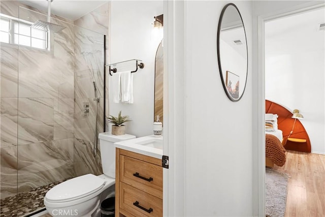63608 Jadeite St, Joshua Tree, CA 92252 - full bath featuring vanity, a marble finish shower, and wood finished floors