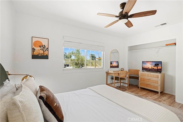 63608 Jadeite St, Joshua Tree, CA 92252 - bedroom with wood finished floors and a ceiling fan