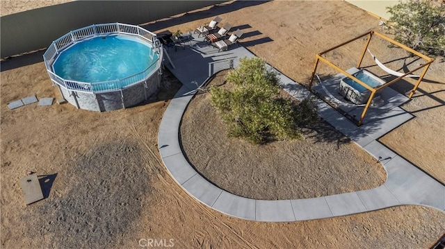 63608 Jadeite St, Joshua Tree, CA 92252 - drone / aerial view of a pool