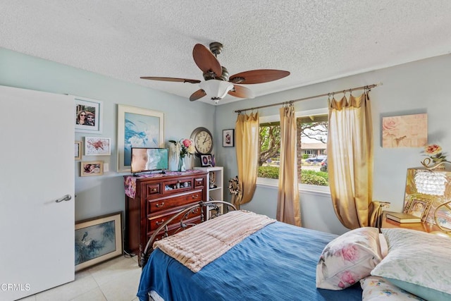 130 E Bay Blvd, Port Hueneme, CA 93041 - tiled bedroom featuring a textured ceiling and a ceiling fan