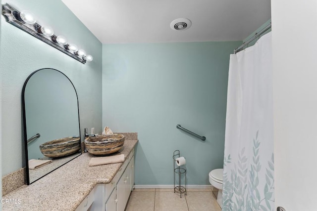 130 E Bay Blvd, Port Hueneme, CA 93041 - bathroom with vanity, tile patterned floors, and a shower with shower curtain
