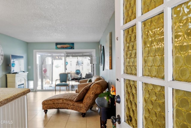 130 E Bay Blvd, Port Hueneme, CA 93041 - tiled living area featuring a textured ceiling
