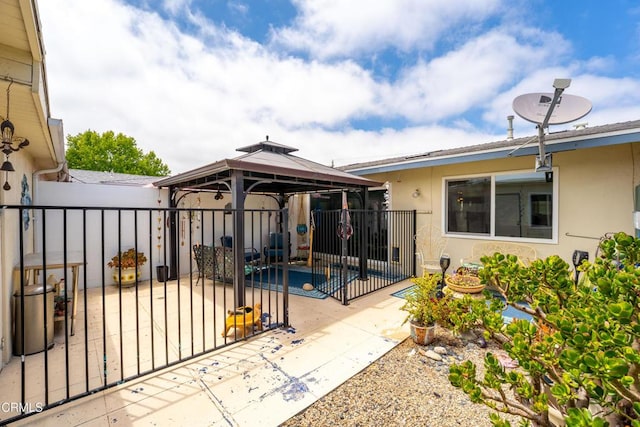 130 E Bay Blvd, Port Hueneme, CA 93041 - back of house featuring stucco siding, a gazebo, and a patio area