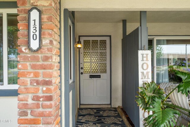 130 E Bay Blvd, Port Hueneme, CA 93041 - property entrance featuring brick siding and a porch