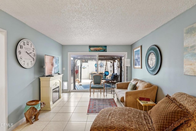 130 E Bay Blvd, Port Hueneme, CA 93041 - living room featuring light tile patterned flooring and a textured ceiling
