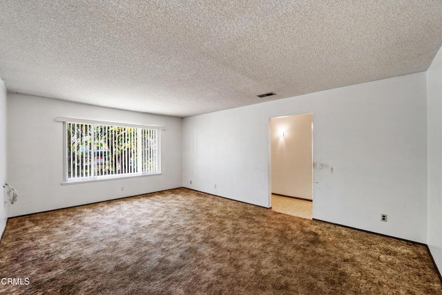 1921 Lincoln Ct, Oxnard, CA 93033 - empty room with carpet flooring and a textured ceiling