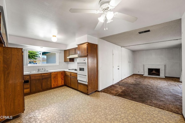 1921 Lincoln Ct, Oxnard, CA 93033 - kitchen with white appliances, light countertops, a warming drawer, light flooring, and a ceiling fan