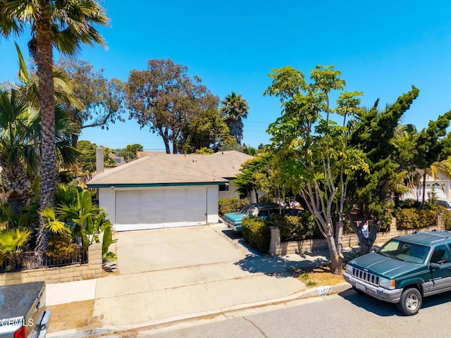 1921 Lincoln Ct, Oxnard, CA 93033 - view of front of home featuring a garage and concrete driveway