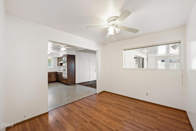 1921 Lincoln Ct, Oxnard, CA 93033 - spare room with a ceiling fan, healthy amount of natural light, and wood finished floors