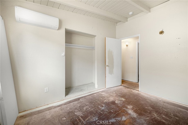 609 S Lassen St, Willows, CA 95988 - unfurnished bedroom with a wall unit AC, a closet, and beam ceiling