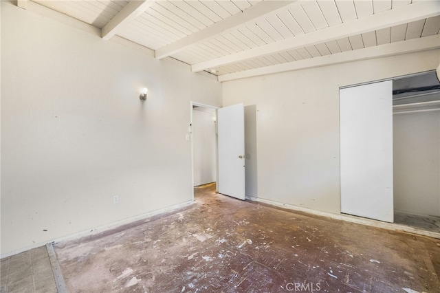 609 S Lassen St, Willows, CA 95988 - unfurnished bedroom with concrete floors, beam ceiling, and a closet