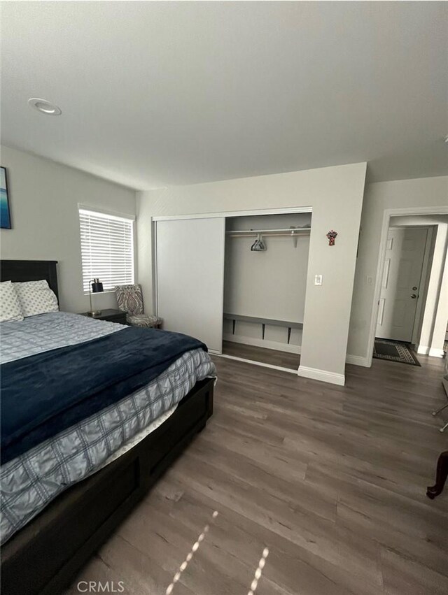 1303 W 109th Pl, Los Angeles, CA 90044 - bedroom featuring wood finished floors and a closet
